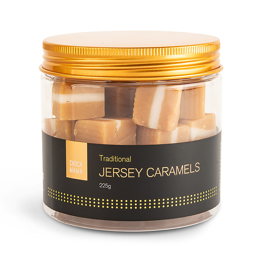 Clear tub of striped jersey caramel cubes with a gold screw lid and a black label dotted in gold