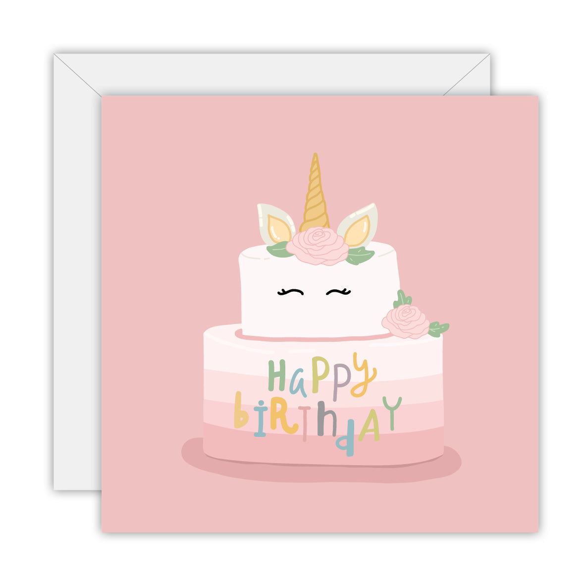 Square pink card with a two-tier unicorn cake with a gold horn and pastel Happy Birthday letters, on a white envelope