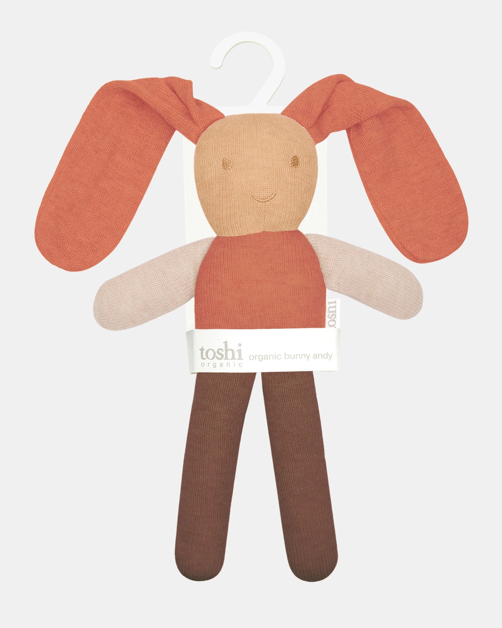 The oatmeal Bunny Bobby on its Toshi organic hanging card, ready to gift