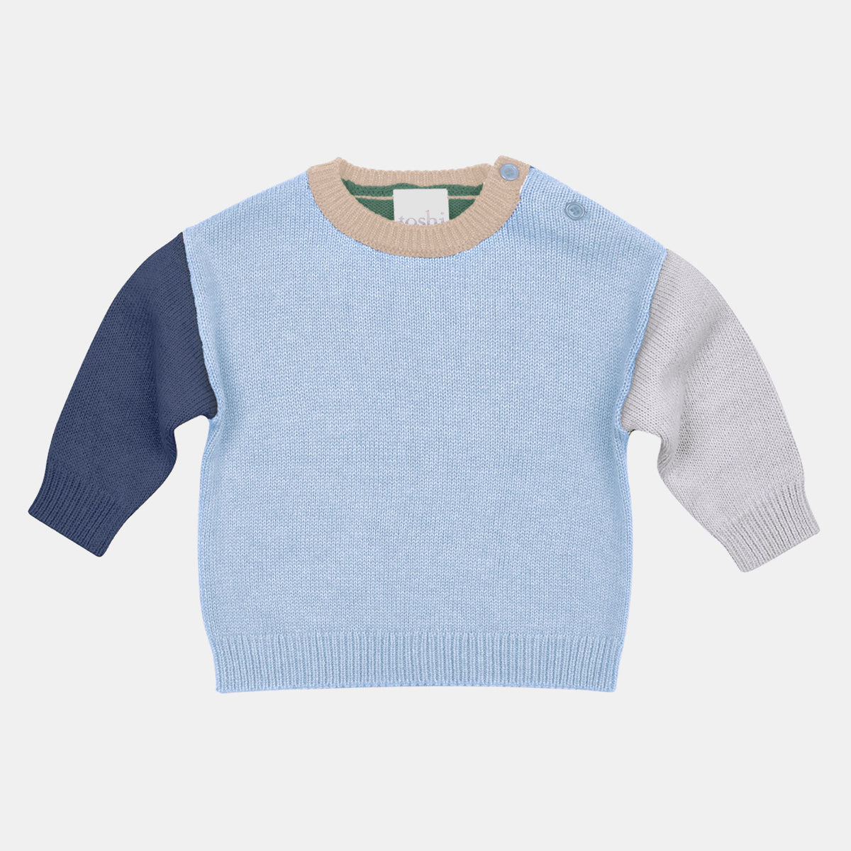 Toshi Organic Pullover Bobby Bluebell, a pale blue knit with navy and grey colour-block sleeves and a tan collar, laid flat