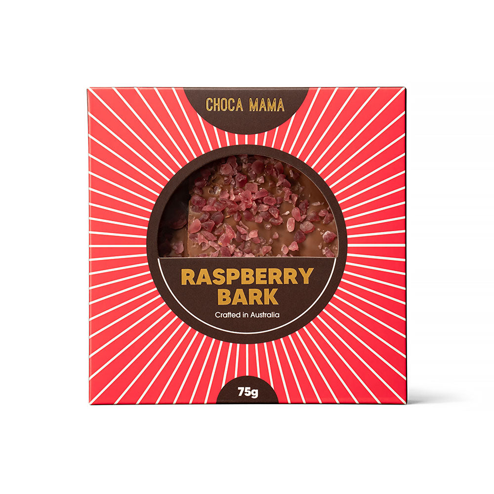 Front of the red sunburst raspberry bark box, the bark visible through the round window