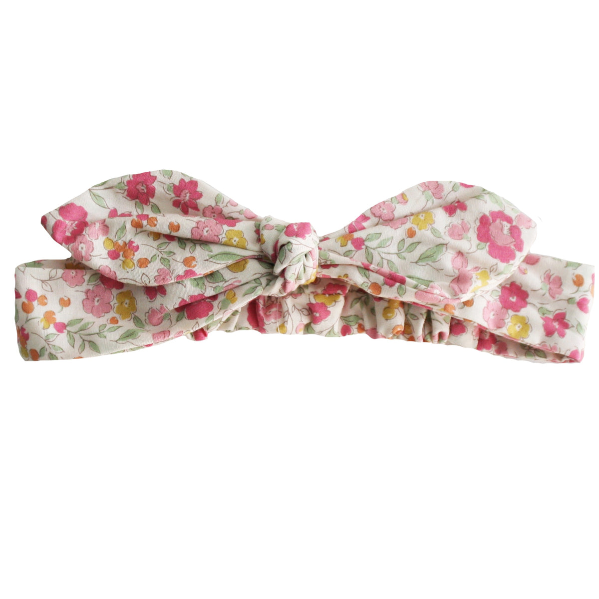 Knotted cotton head bow in a cream fabric with pink and yellow flowers