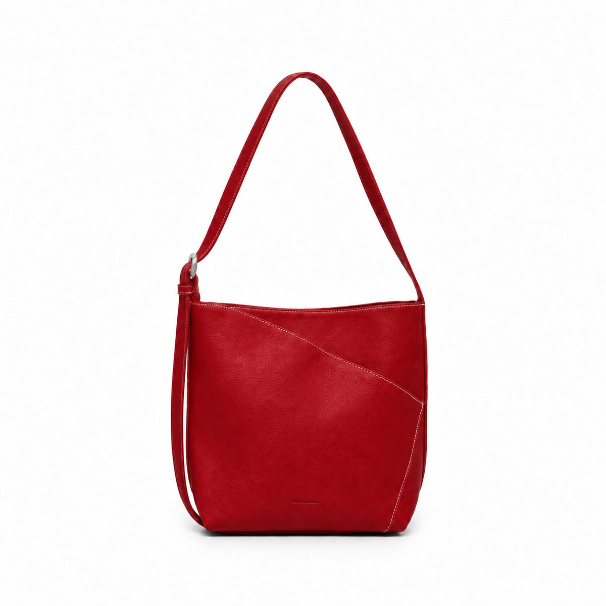The red shoulder bag square on, showing the curved seam that forms its front pocket.