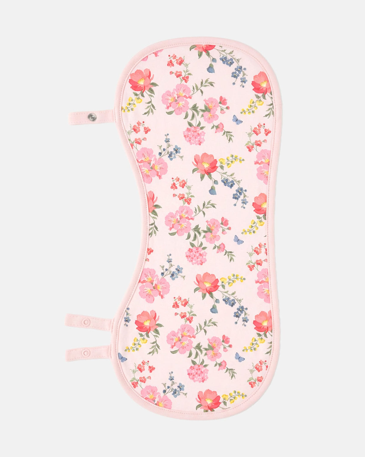 The burp cloth with its press-stud side tabs opened out