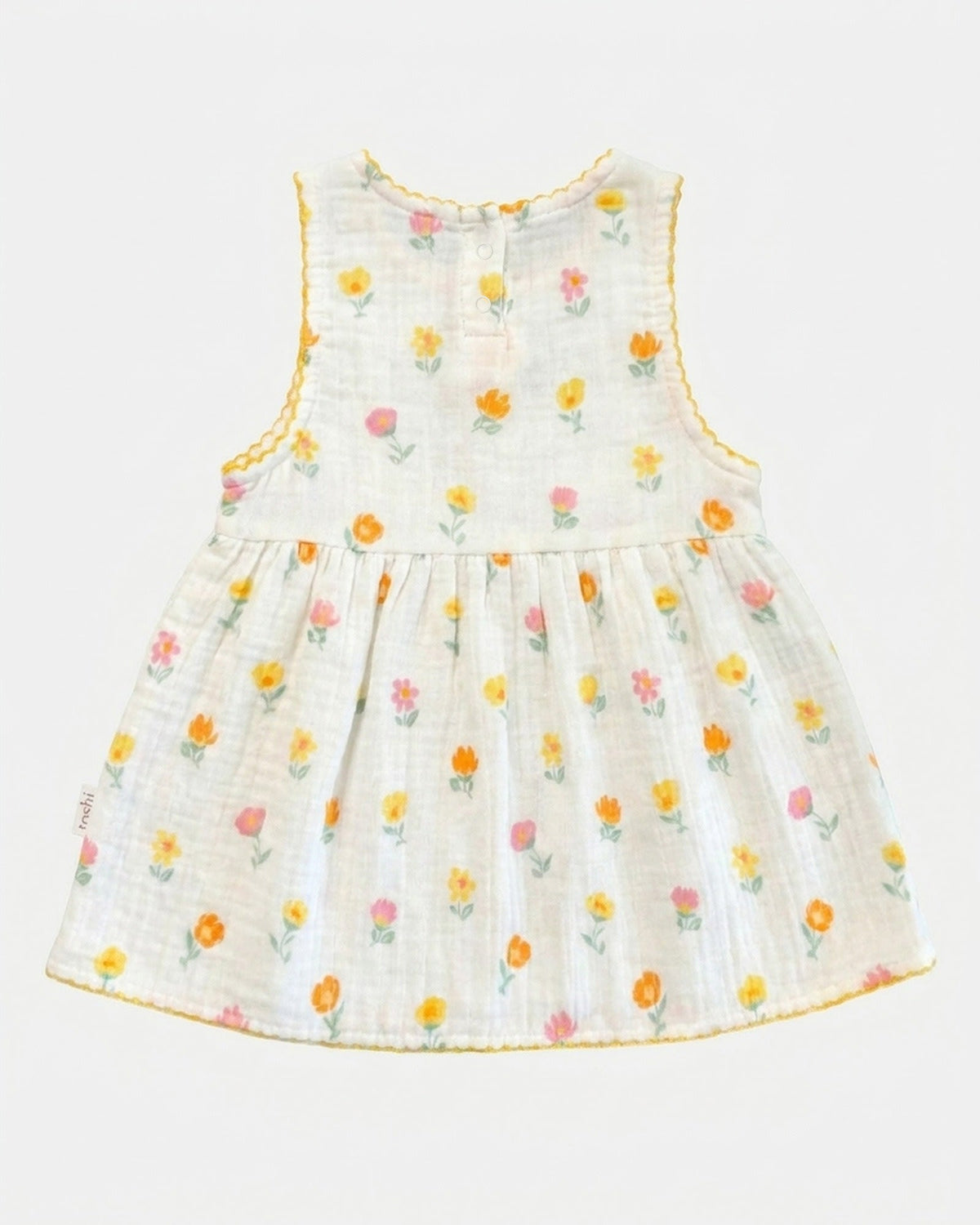 Back of the Pippa dress with two press studs at the neck and a yellow-trimmed hem