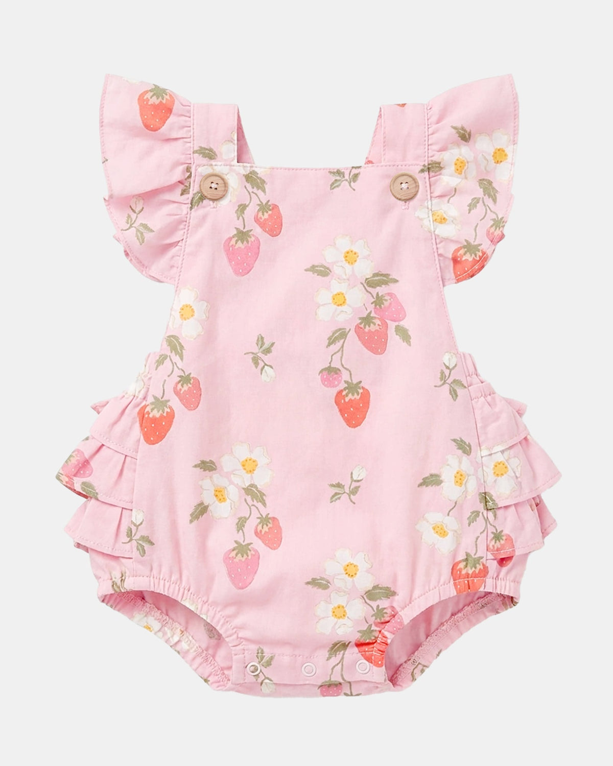 Toshi Strawberry Fields romper in pink cotton printed with strawberries and white blossoms, with frilled straps and two brown buttons