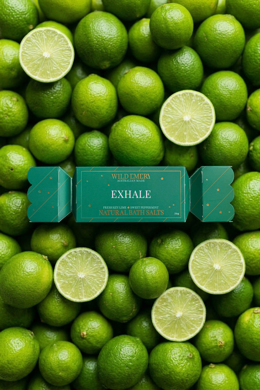 The Exhale bon bon on a pile of whole and halved limes.