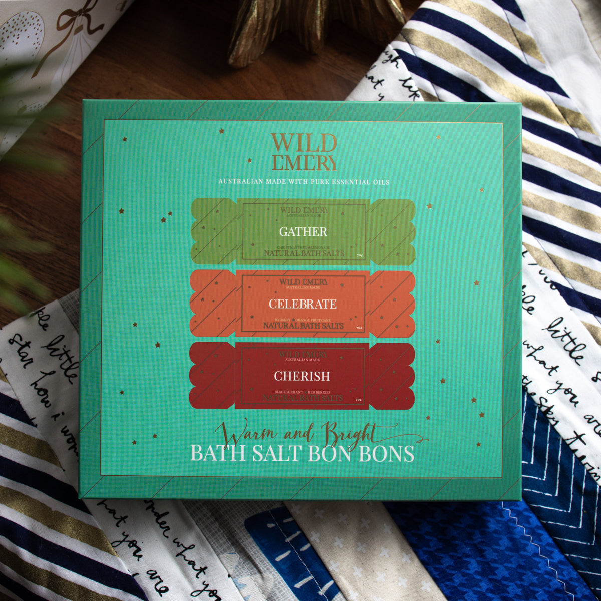 Mint green Warm and Bright gift box printed with three bath salt bon bons: Gather, Celebrate and Cherish.