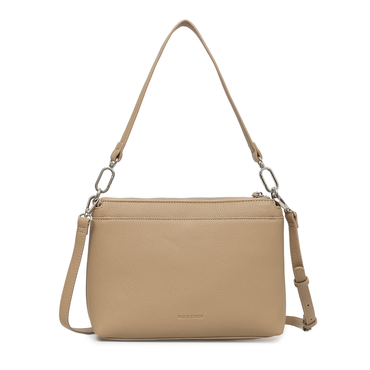 The back of the biscuit bag with the shoulder strap and the cross body strap attached.