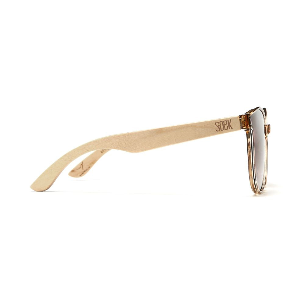 Side profile of the Bella Champagne sunglasses showing the white maple arm engraved with Soek