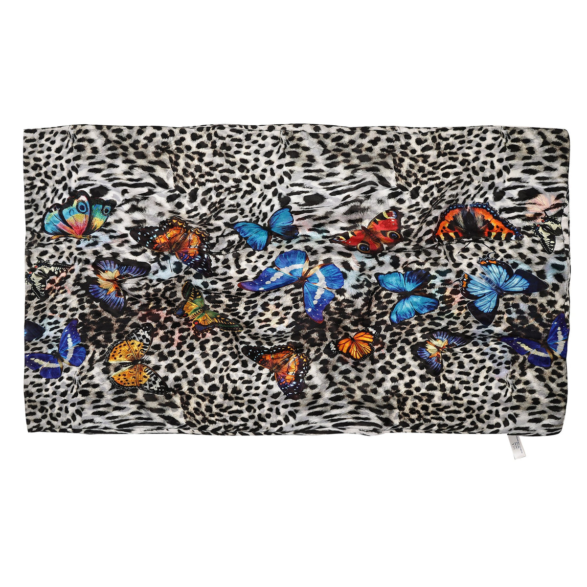 The Butterfly Jungle scarf laid flat, with a band of butterflies across the leopard print