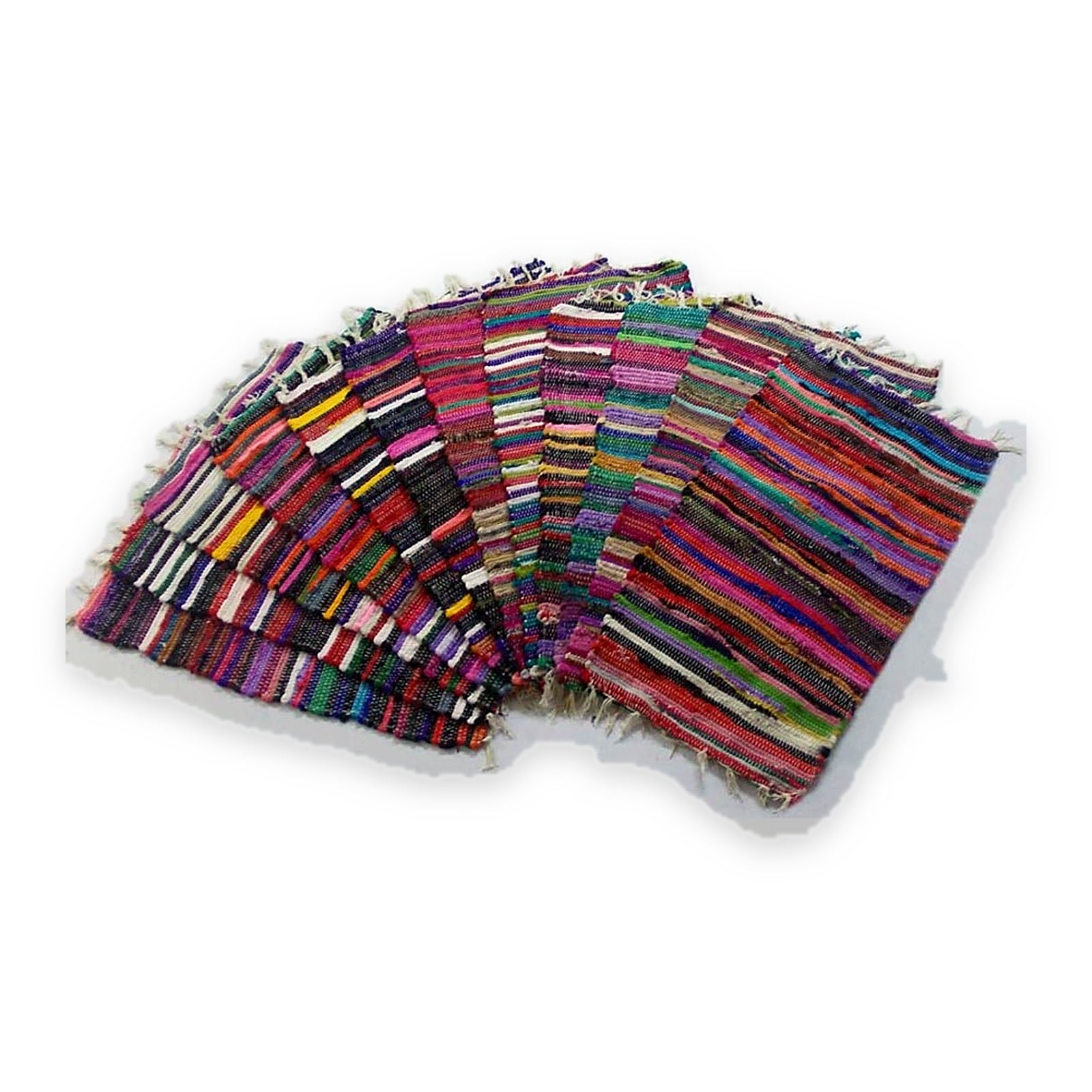 Ten handwoven chindi rugs fanned out in a stack, each a different mix of multicoloured recycled-fabric stripes with cream fringed ends, showing how much the colourways vary.