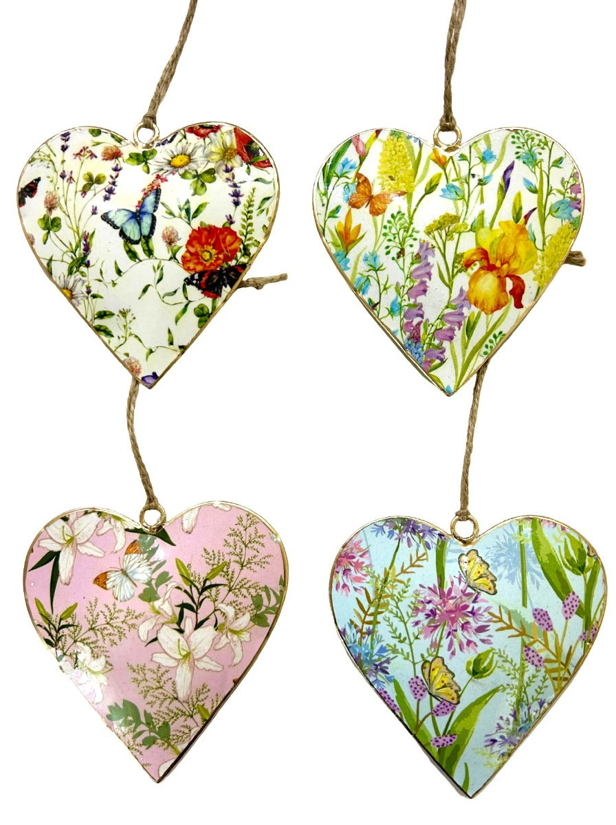 The designs in this set of hanging hearts on twine loops: wildflowers and butterflies on white, cream, pink and pale blue