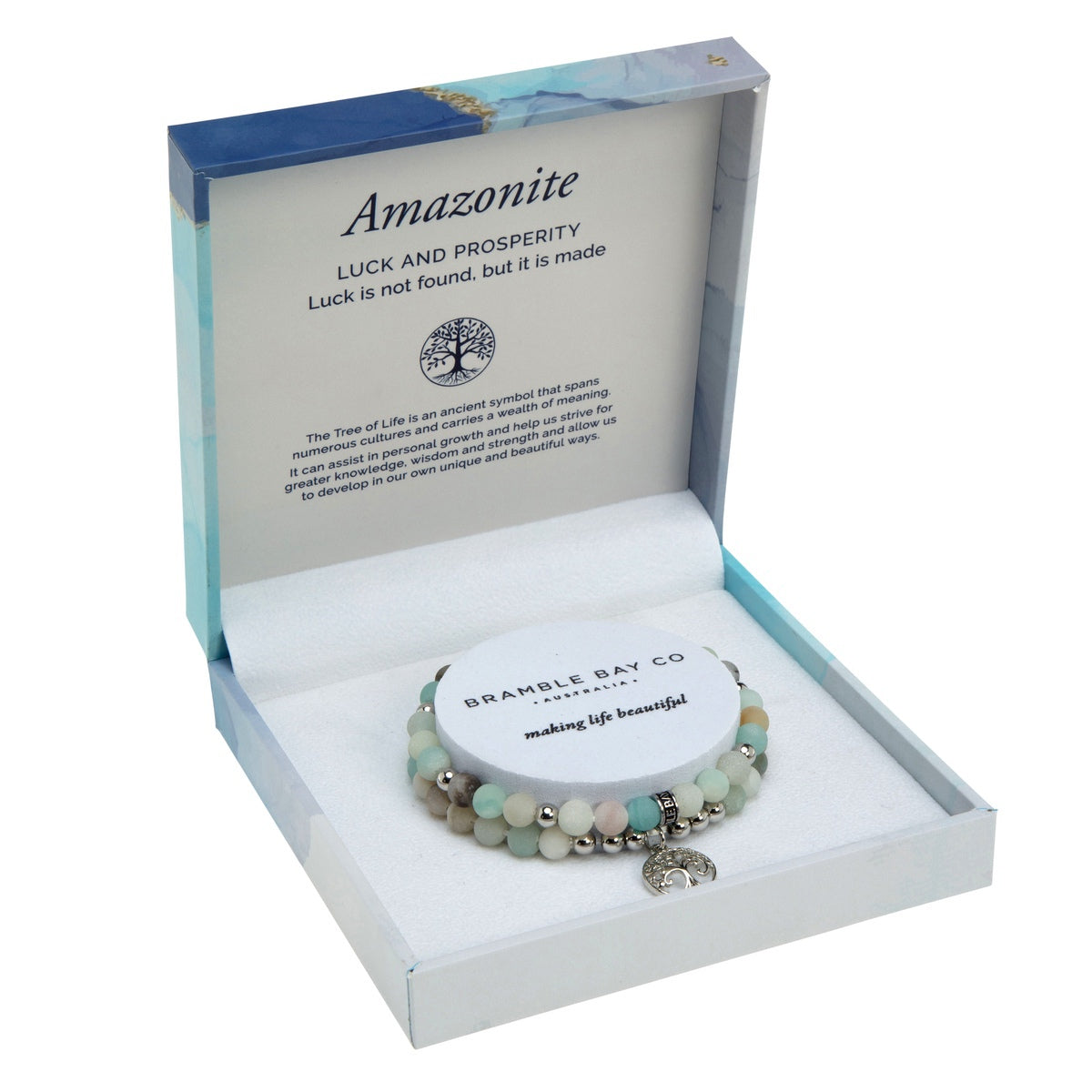 Two matte amazonite bead bracelets in mint and cream with silver spacers and a Tree of Life charm, in an open blue marble gift box