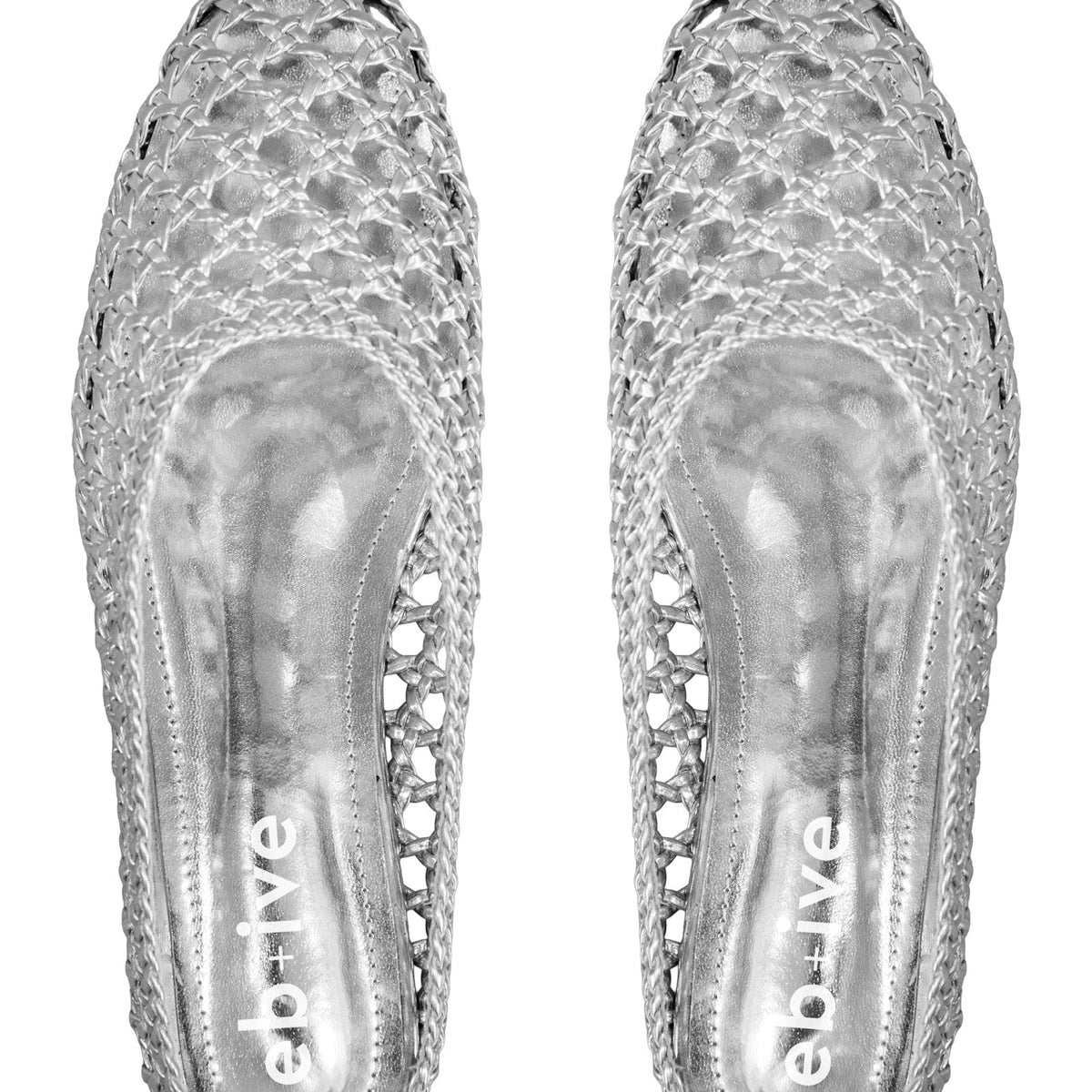 Pair of silver Dusk Slides from above, showing the open-weave uppers and silver footbeds