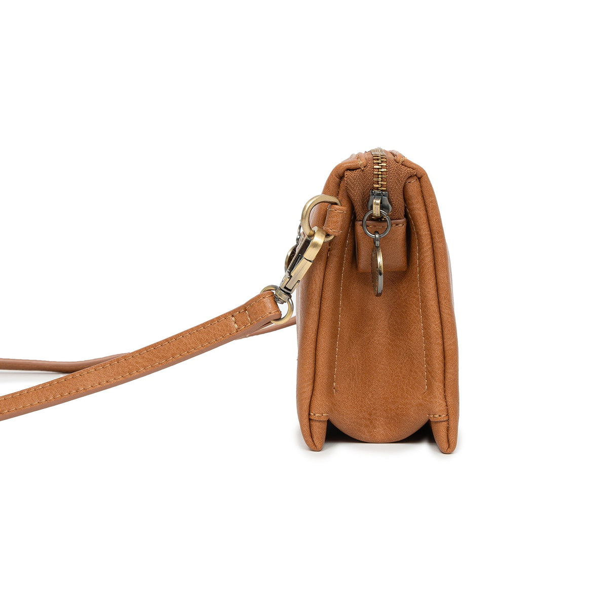 Side view of the tan bag, showing its depth and a strap clip.