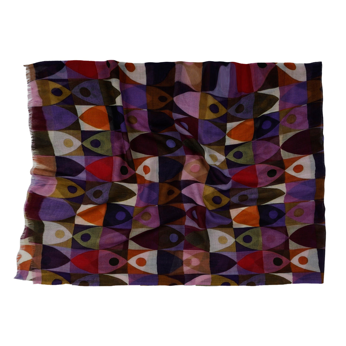 The geometric print scarf laid flat with its fringed ends