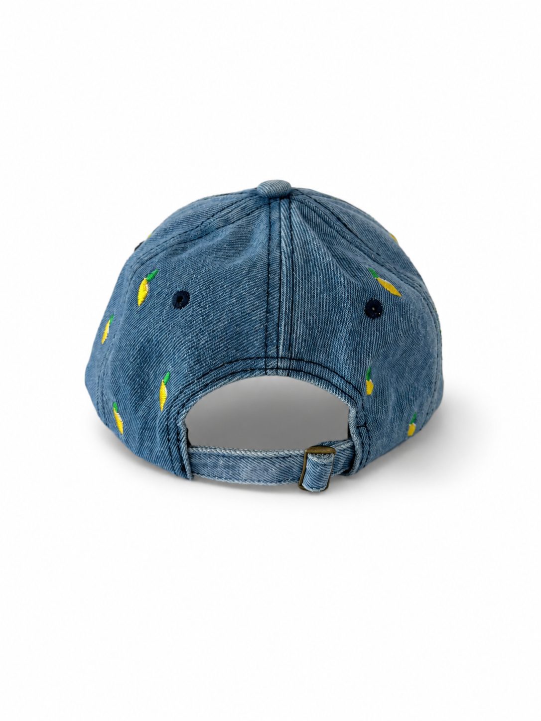 Back of the mid-wash denim lemon cap, showing the open gap and adjustable metal-buckle strap.
