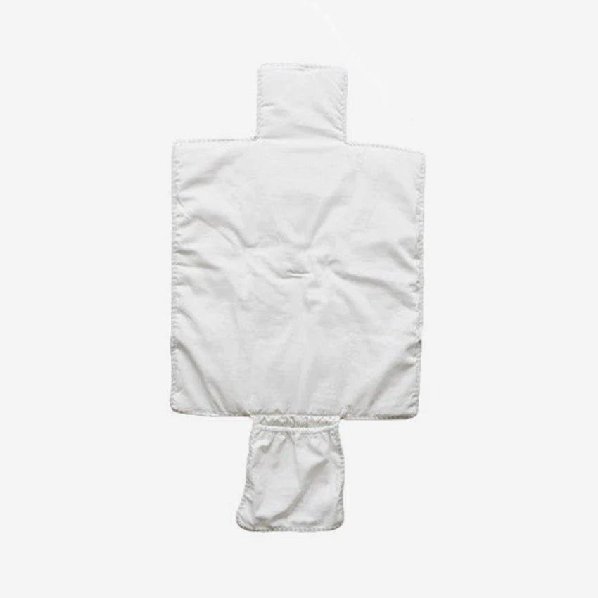 The change mat opened flat, showing its white lining and the pocket at one end.