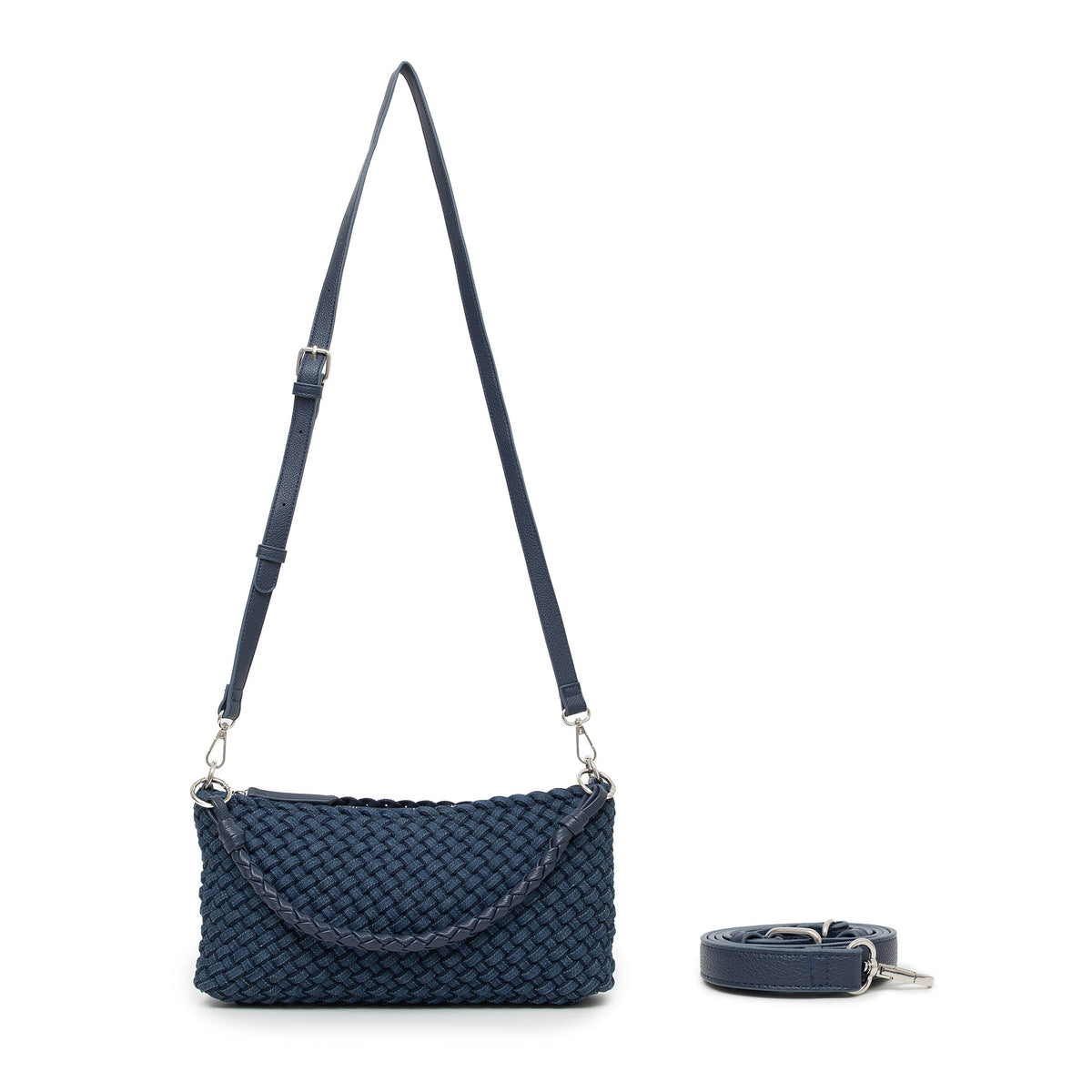 The woven bag hanging from its long adjustable strap.