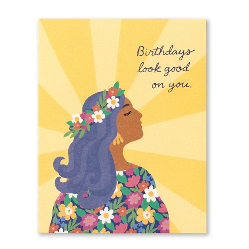 Birthdays Look Good on You card of a woman with a flower crown against golden sunburst rays
