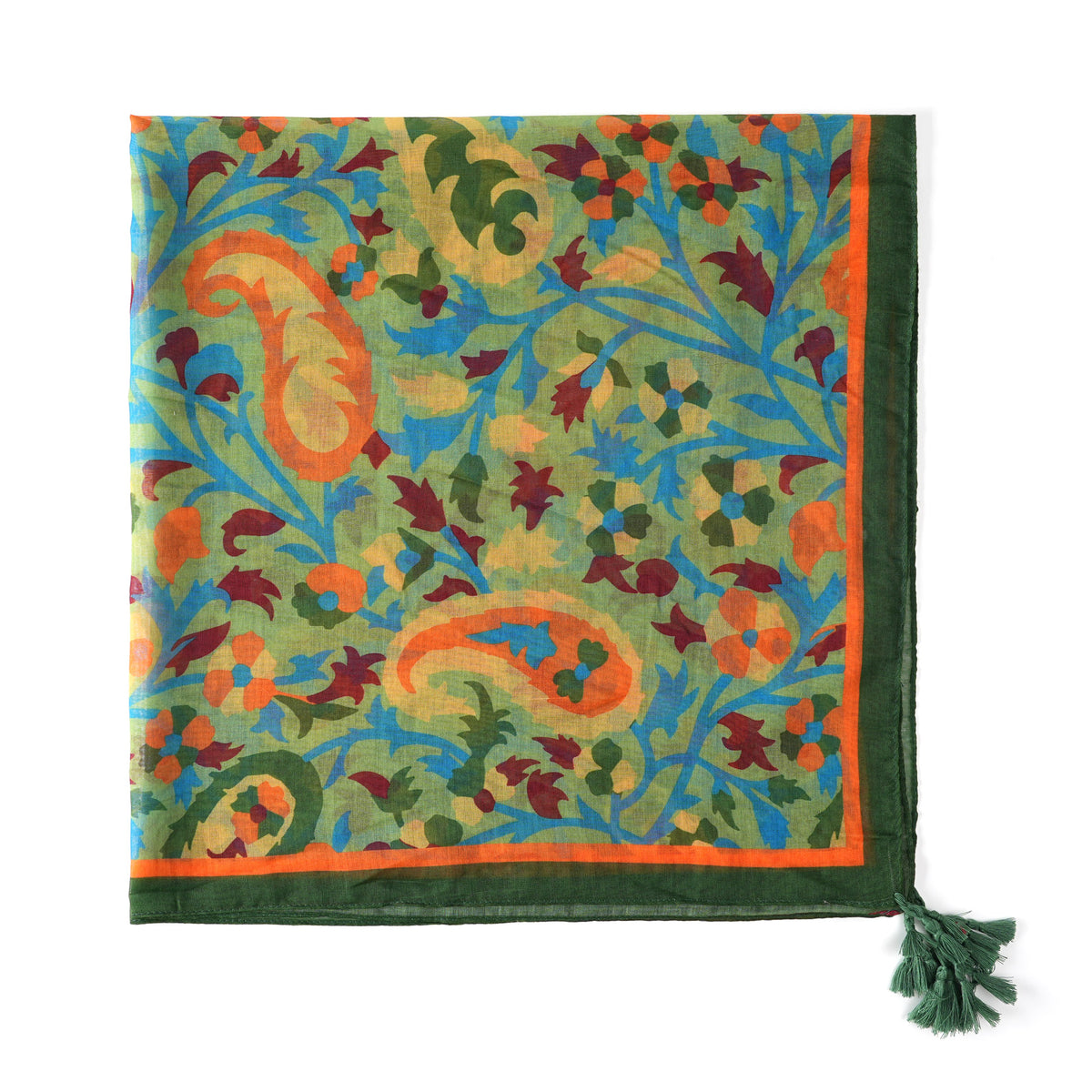 Corner detail of the paisley print with a green tassel