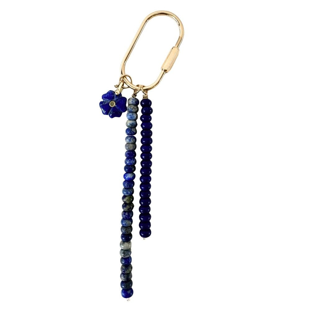 Gold carabiner keyring with two strands of deep blue stone beads and a blue flower charm
