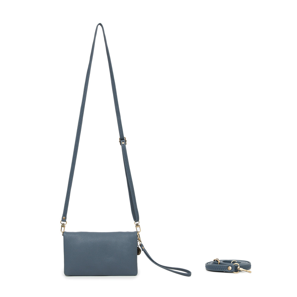 The slate blue wallet hanging from its long cross body strap, wrist strap attached, with a third strap coiled beside it.