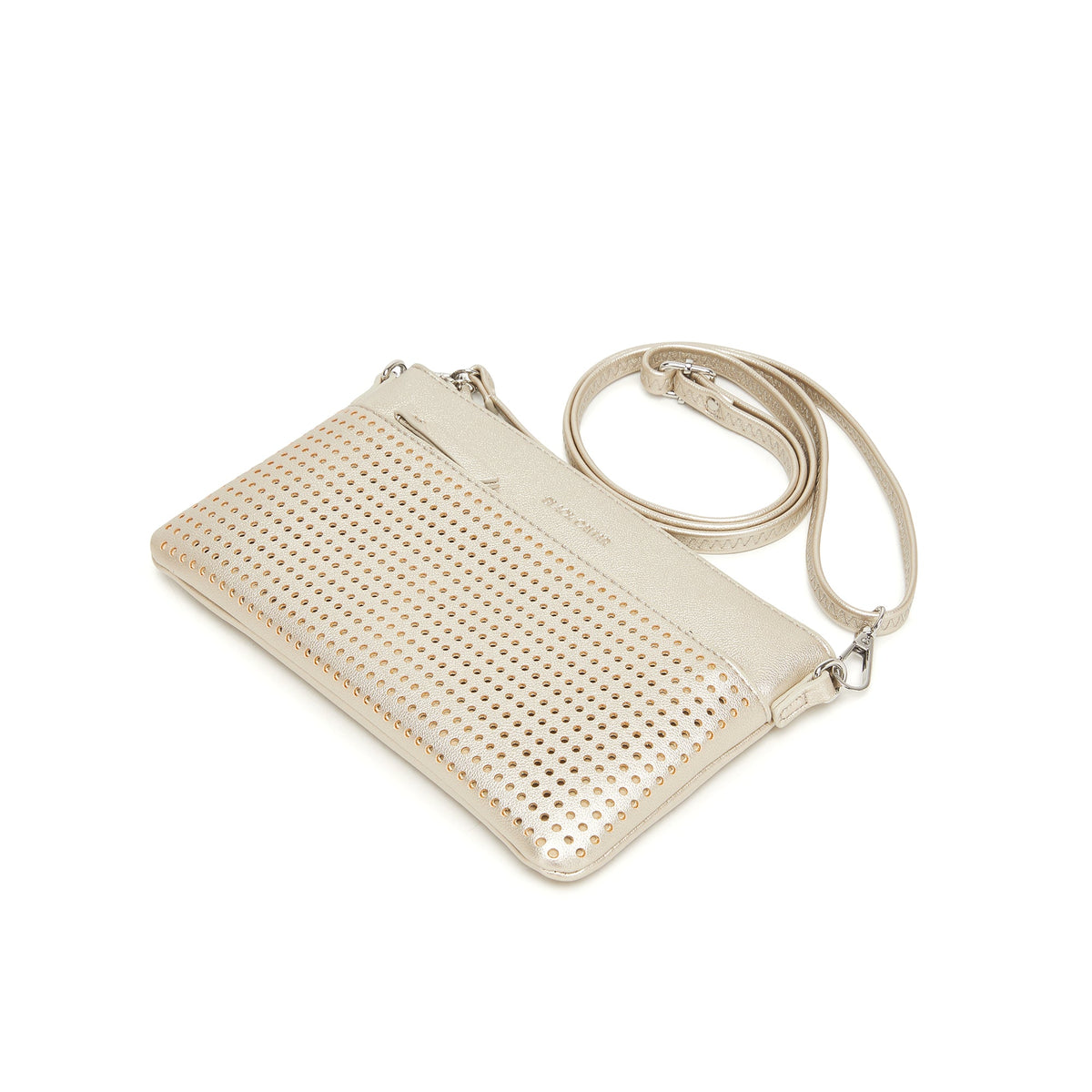 The gold clutch lying flat at an angle, with the long strap looped behind.
