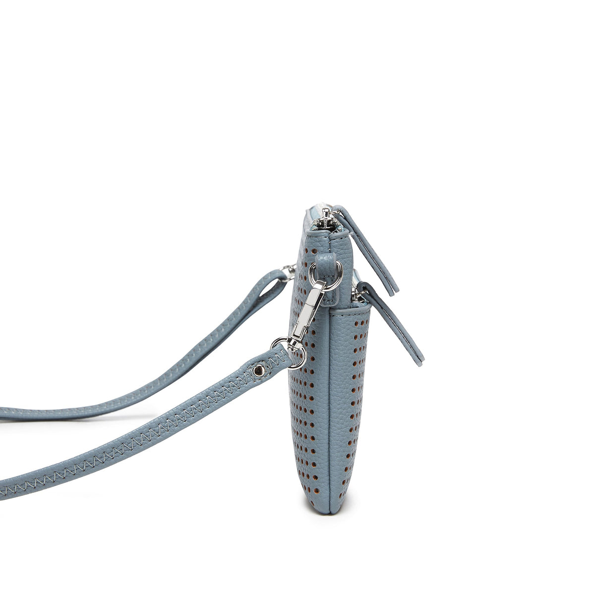 Side view of the blue clutch, showing its slim depth and strap clips.