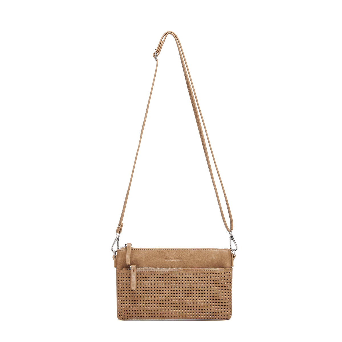 The tan clutch hanging from its long adjustable strap.