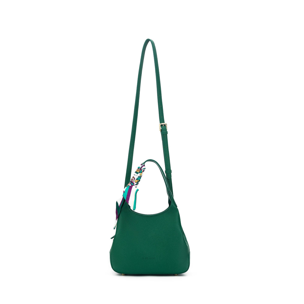 The green bag hanging from its long adjustable strap.