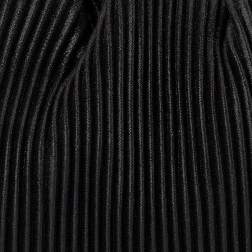 Close-up of the fine black pleats