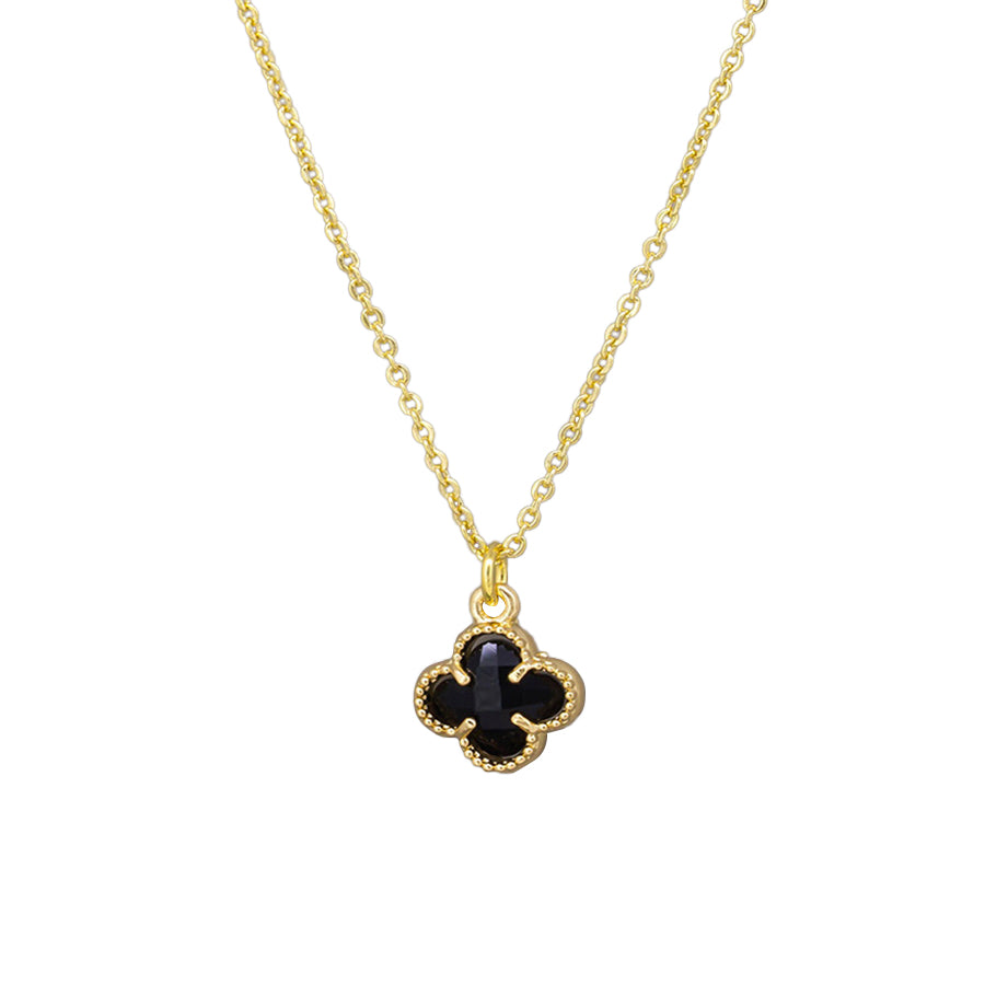 Gold Felice necklace with a black clover pendant on a fine chain