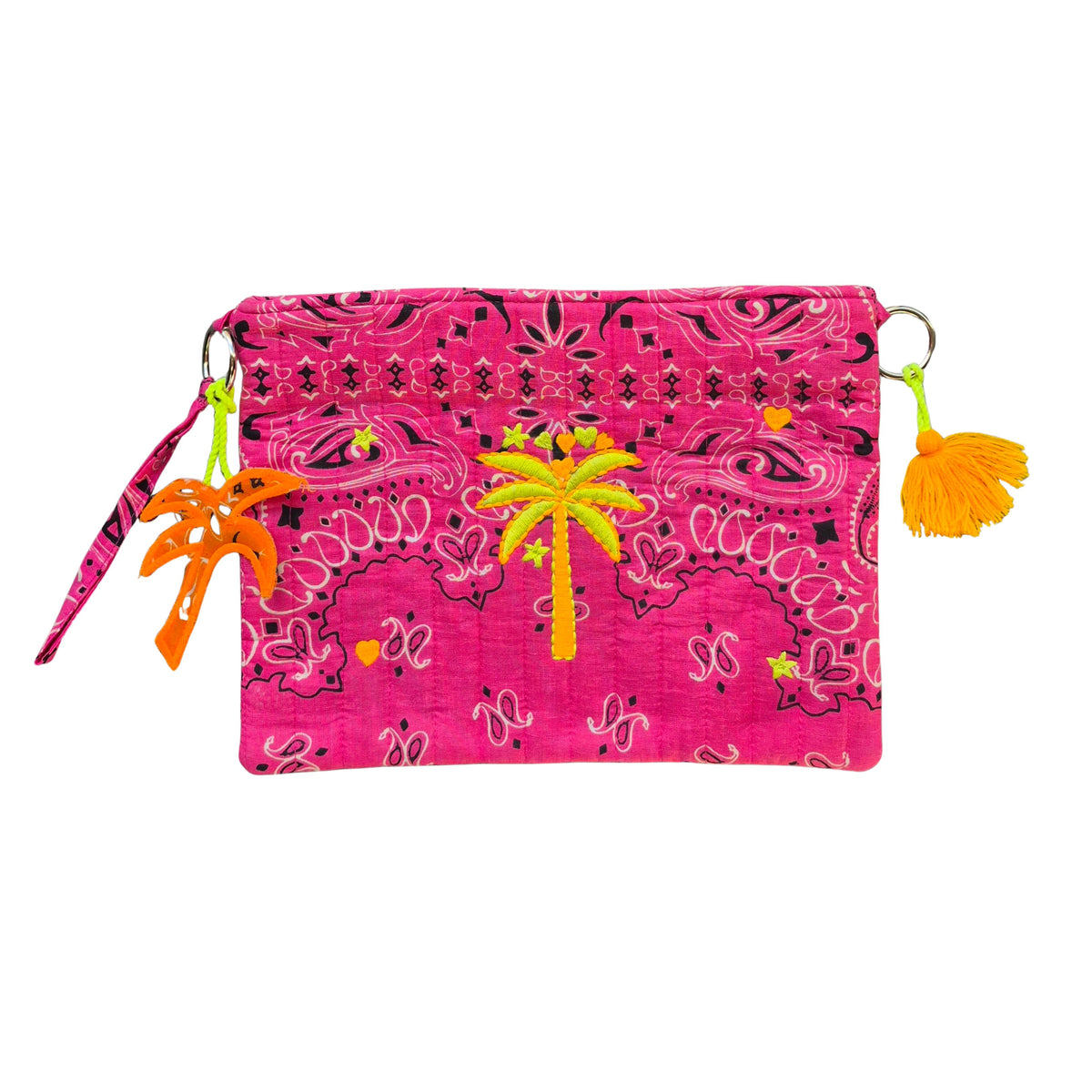 Hot pink quilted bandana-print pouch with an embroidered lime and orange palm tree, an orange palm tree charm and pink wrist strap on one side and an orange tassel on the other.