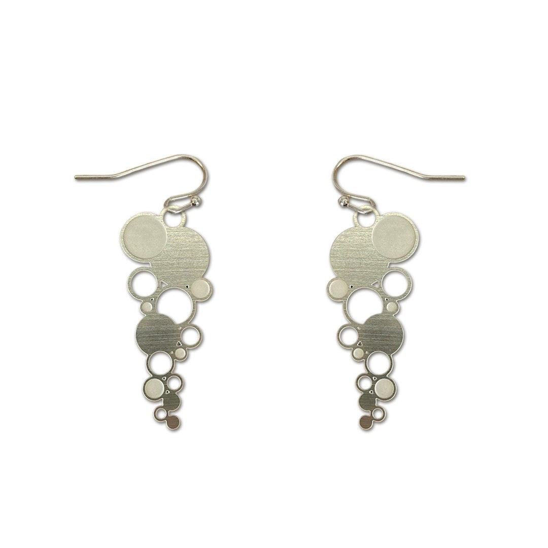 The Pearls of Wisdom earrings on white: cascades of silver steel circles on hooks.