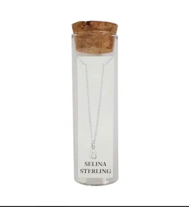 Selina sterling silver letter B initial necklace in its cork-topped glass gift tube