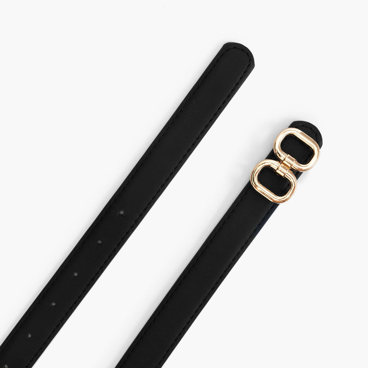 The double-oval belt angled across a pale background, buckle at the top.