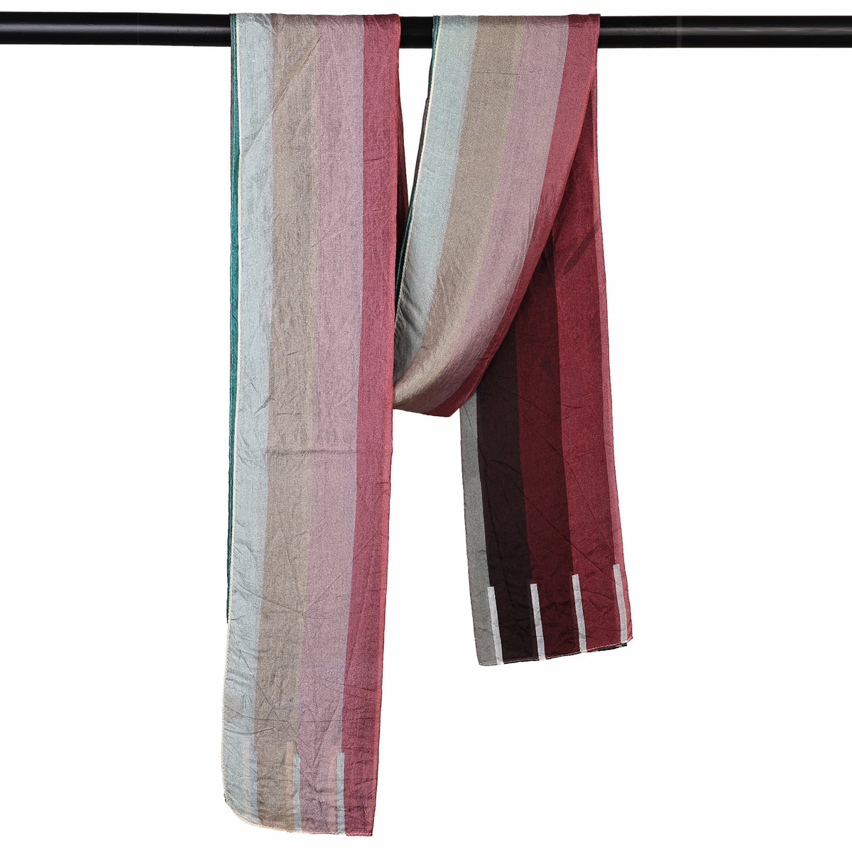The Sunset Spectrum Stripes scarf hanging over a rail, showing the rose, grey and wine stripes