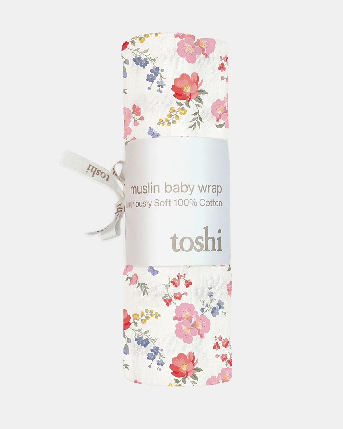 The Wild Garden wrap rolled in its Toshi muslin wrap band with a ribbon tie