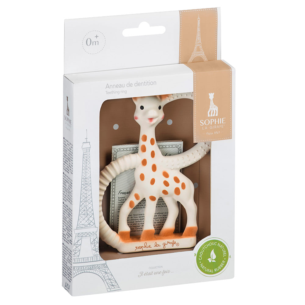 The ring teether in its printed retail box with a clear front panel and an Eiffel Tower illustration.