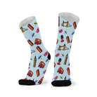 Pair of pale blue socks with black toes, printed with Big Ben, Tower Bridge, red double-decker buses and red phone boxes.