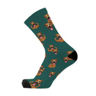 Single deep forest green crew sock with a black toe, printed with tan boxer dogs.