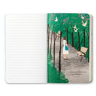 Open journal with lined pages and a breakout page of a walker under green trees with white birds