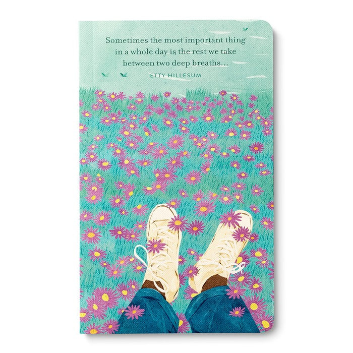 Journal cover of feet resting in a pink wildflower meadow, with an Etty Hillesum quote about rest between two deep breaths