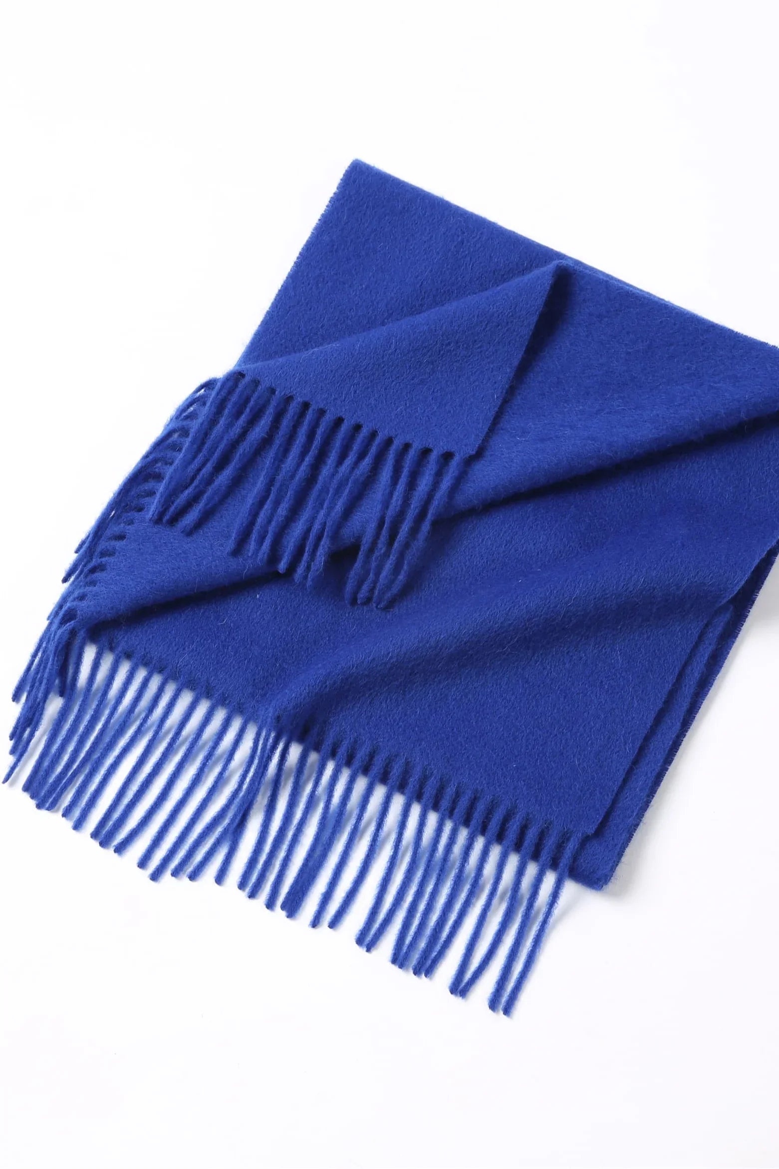Veronica Blue scarf folded flat with fringe