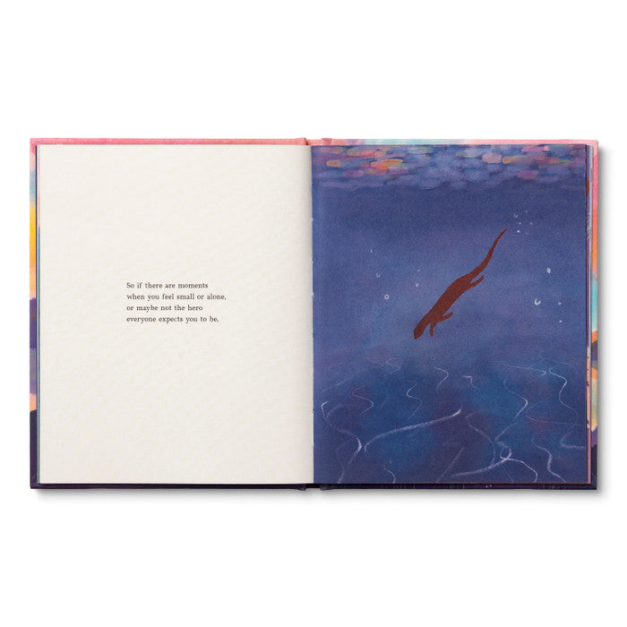 Open spread with a short passage beside a deep blue painting of a fish beneath the surface