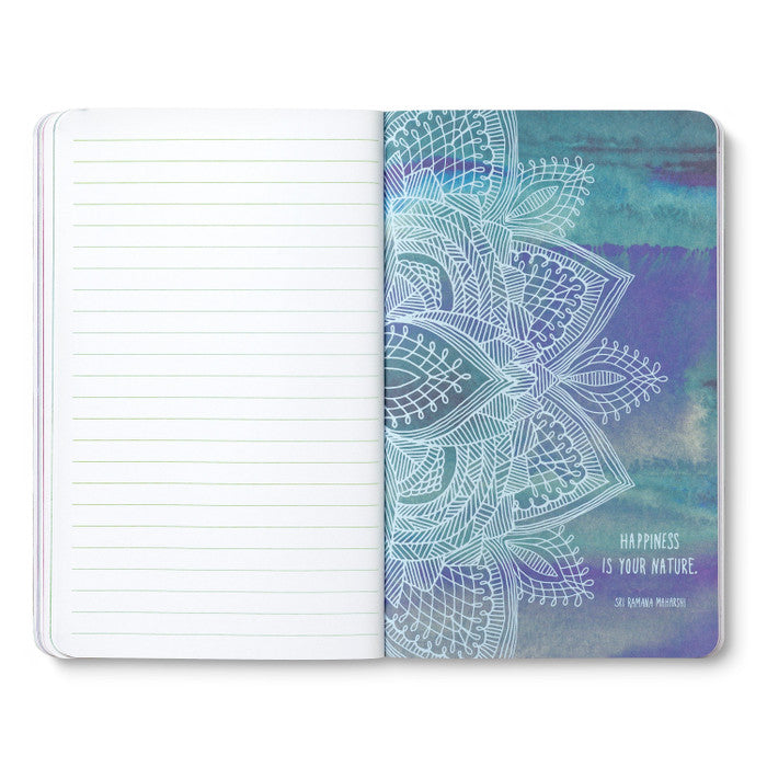 Open journal with lined pages beside a blue-green breakout page of a line-drawn lotus