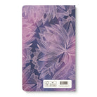 Back cover continuing the pink and purple lotus artwork, with the barcode panel