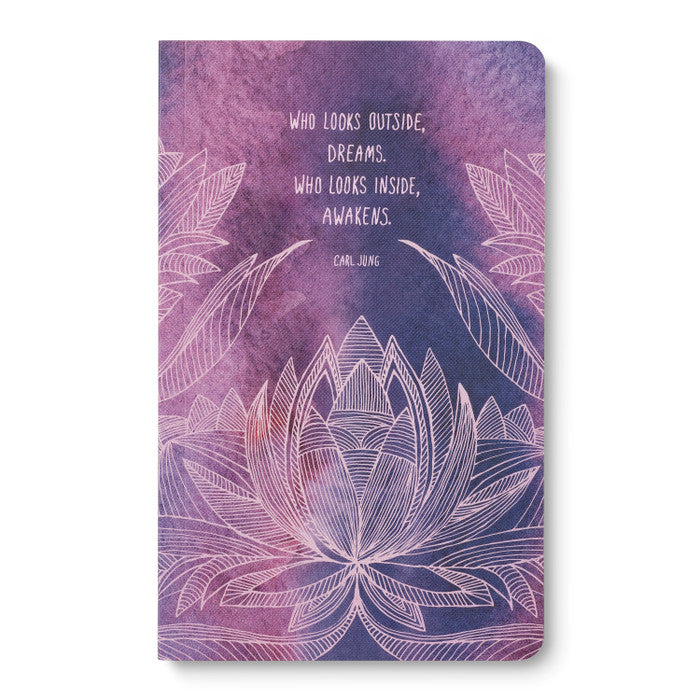 Journal cover with a white line-drawn lotus on deep purple and pink, lettered with the Carl Jung quote about looking outside and inside